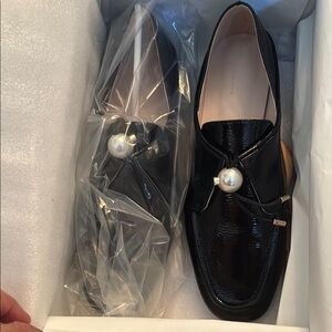 The Row Black Patent Leather Flats with Pearl Accent